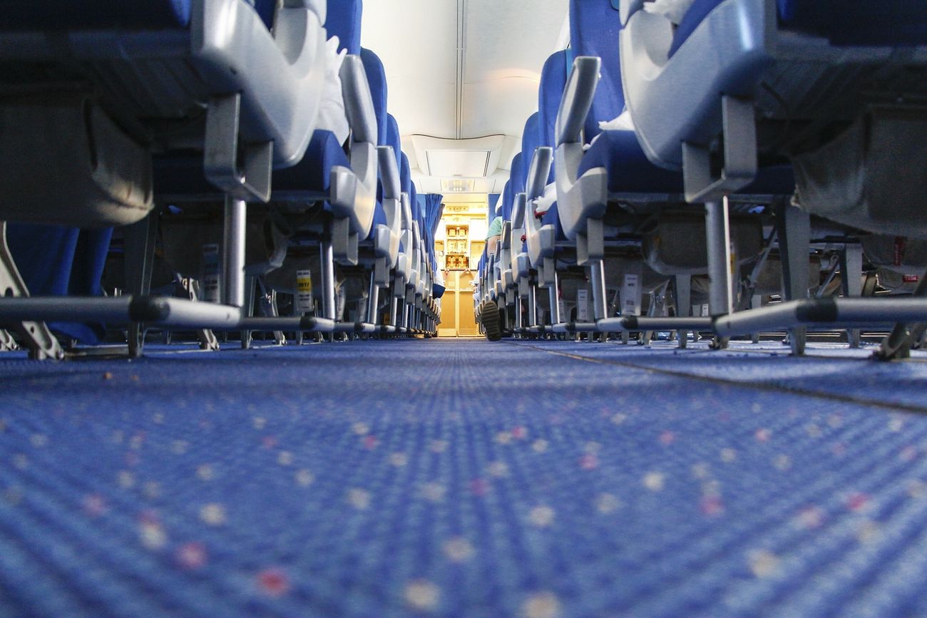 Empty seat, plane aisle
